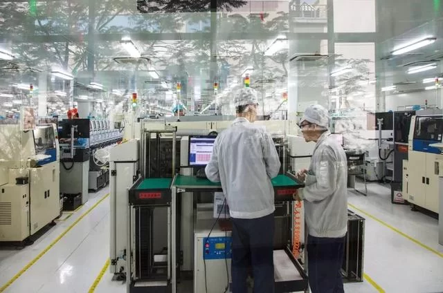 李志良：用镜头追寻“东莞制造”传奇(图3)